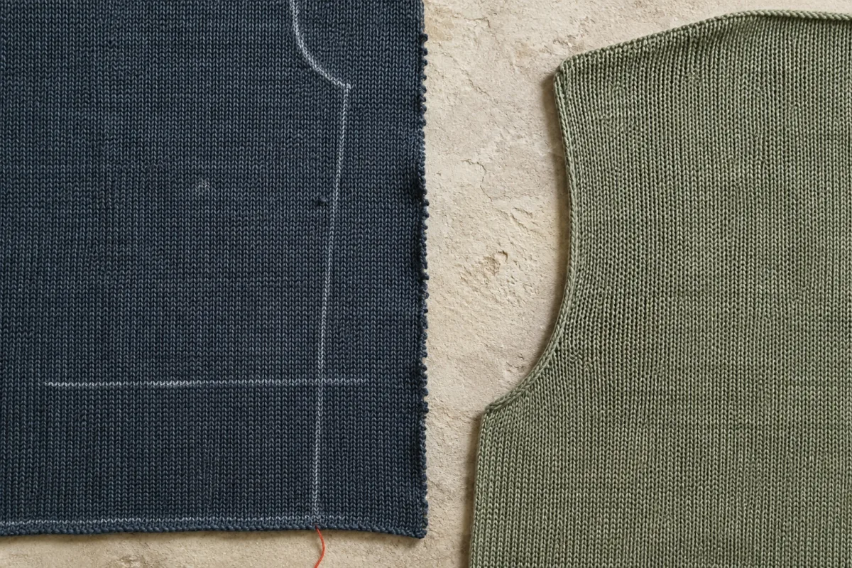 On the left a jersey panel cut from yardage, its edge raw and curling with chalk marks still on the face; on the right a knitted panel shaped on the machine, its armhole edge finished in the knit with nothing cut